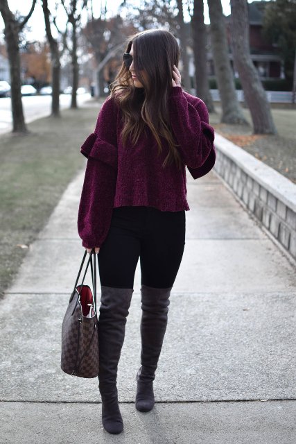 With black leggings, over the knee boots and printed tote