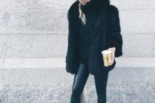 With black sweater, black leather pants and black fur coat