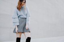 With checked high-waisted skirt and black over the knee boots