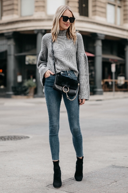 With crossbody bag, skinny jeans and black suede ankle boots