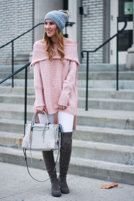 With fur pom pom hat, white leggings, white tote and gray boots
