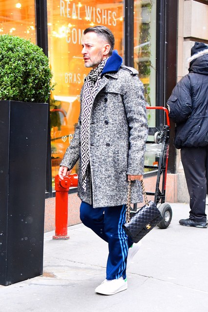With gray coat, printed scarf and white sneakers