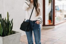 With jeans, black flat shoes and black crossbody bag