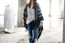 With loose sweatshirt, distressed jeans and flat shoes