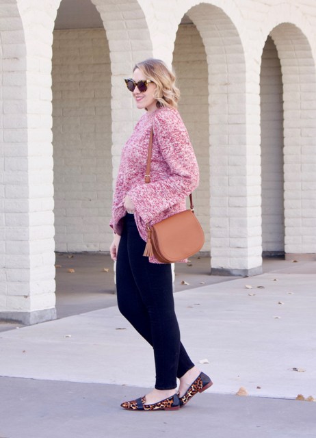 With navy blue leggings, brown bag and printed flat shoes