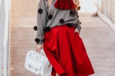 With red midi skirt, white bag and white shoes