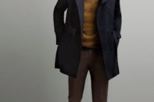 With shirt, navy blue coat, brown pants and boots