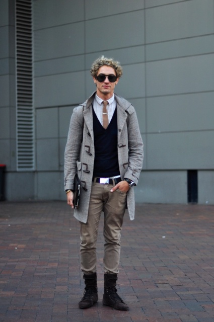 With shirt, tie, gray coat, beige pants and mid calf boots
