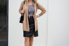 With striped shirt, light brown cardigan, black bag and black ankle boots