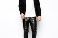 With white t-shirt, black blazer and black boots