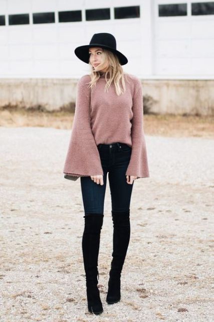 With wide brim hat, jeans and black high boots