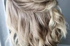a stylish half updo holiday hairstyle