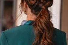 a beautiful low ponytail with a braided halo and some face-framing locks is a cool idea for a cool and catchy look