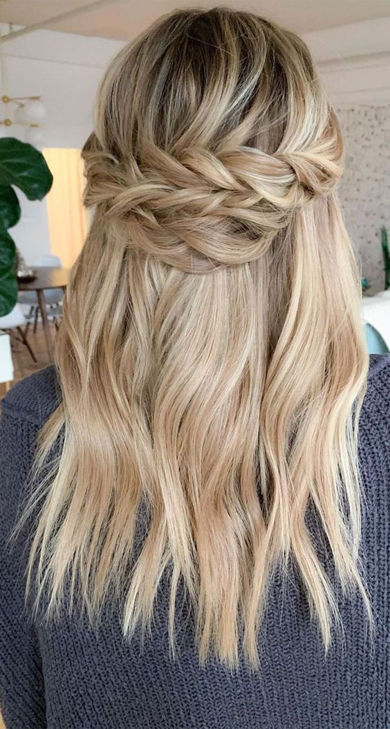 a classic half updo with a bump on top and a double braided halo  plus some waves down is a cool idea