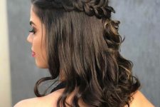 a classic medium half updo with a loose braided halo and waves on the ends is a cool idea for the holidays