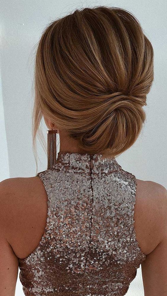 a gorgeous low updo with a volume on top and twists is a lovely idea for the holidays, it looks elegant and chic