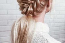 a low ponytail with a large side braid on top and a bump is a beautiful hairstyle that will fit many occasions