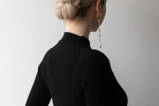a stylish tight woven low bun with pearl hair pins will be a refined and chic party hairstyle to rock