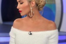a volumetric low bun with a bump on top and some face-framing locks is a lovely idea for the holidays