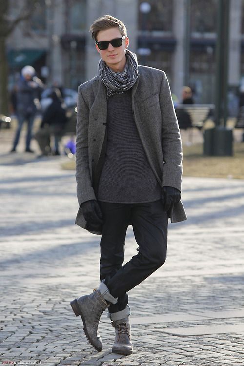black jeans, grey boots, a grey sweater, a printed scarf and a grey coat plus gloves for a casual feel