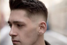 02 a spiked up back medium top and a trimmed mid fade haircut is a bold idea for guys who prefer shorter hair