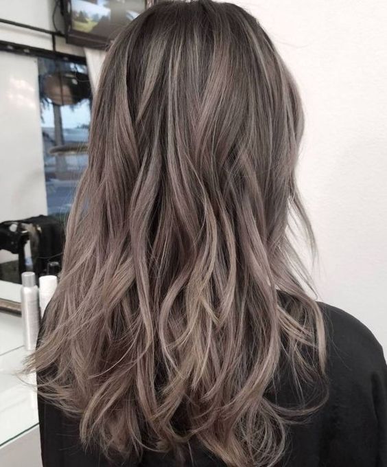 cool long layered ash brown hair is a fresh and modern idea with plenty of texture