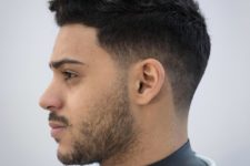 06 a low fade haircut is a stylish idea to rock naturlaly curly hair