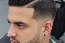 06 a sleek line up haircut with a fade and a beard is a cool and modern option
