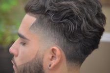 wavy line up hairstyle for a stylish man
