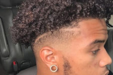 16 an Afro mohawk haircut features trimmed sides and leave your curls free on top