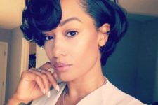 16 an elegant curly short bob done with a retro feel looks very elegant and stylish