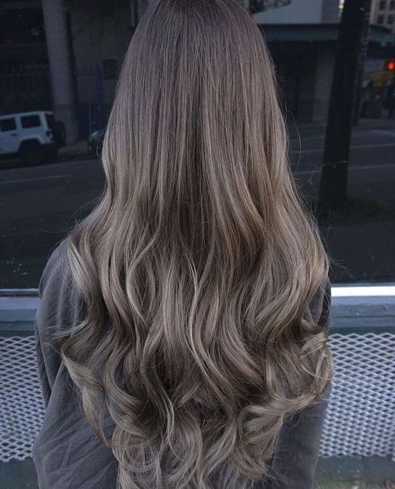 very long and wavy brown hair with ashy brown balayage will give you an edgy look