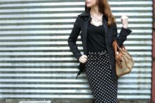 With black top, black jacket, small bag and black flats