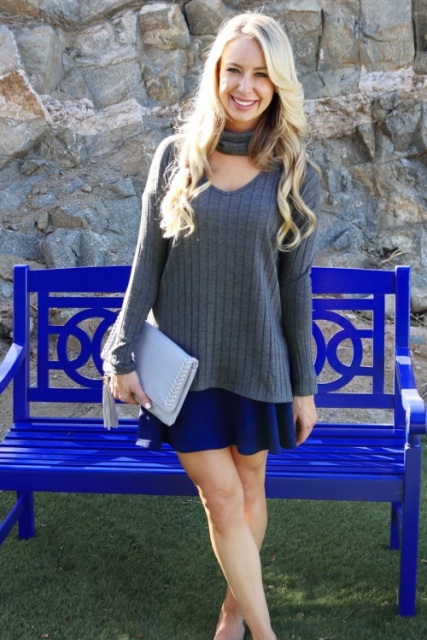 With blue skater skirt and pastel colored clutch