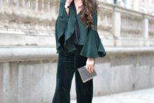 With emerald ruffled blouse, sunglasses and mini clutch
