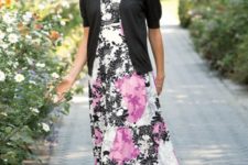 With floral maxi dress and black flat shoes