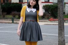 With gray dress, belt, yellow tights and black shoes