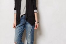 With gray loose sweatshirt, cuffed jeans and flat shoes