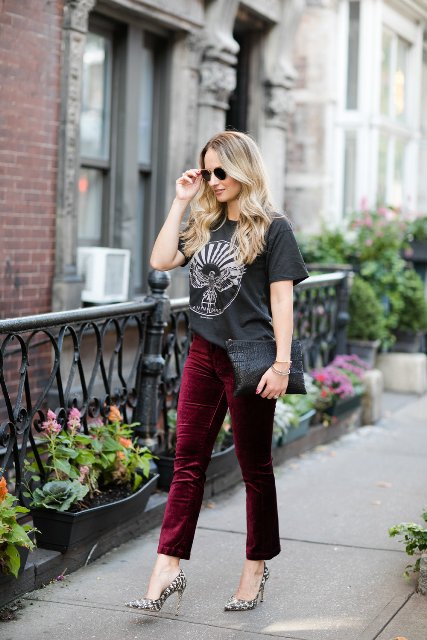 With loose t-shirt, leopard pumps and black clutch