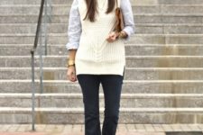 With shirt, clutch, flare jeans and white shoes