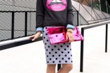 With shirt, printed sweatshirt, pink clutch and pink pumps