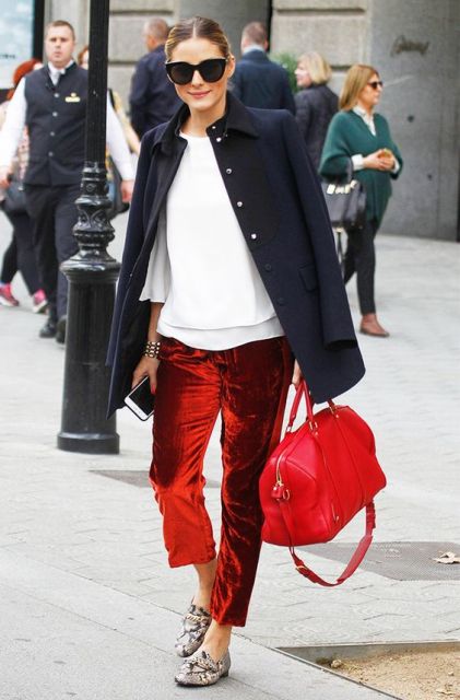 With white loose blouse, navy blue coat, red bag and animal printed flats