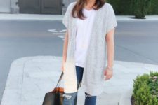 With white loose t-shirt, distressed jeans, black tote and beige pumps