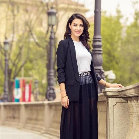 With white t-shirt and black maxi skirt