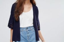With white top and denim high-waisted skirt