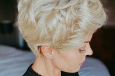 a layered blonde wavy pixie haircut with the right texture and a deep side part is a cool idea
