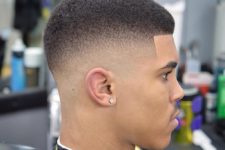 03 short hair and a low taper is a fresh cut with a rounded profile to rock