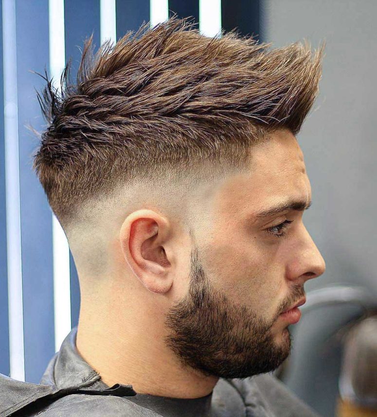 a skin sharp fade faux hawk works well with pointy hair and gives a modern masculine look