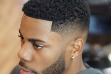 05 a bald fade, short kinky hair and a full beard are a modern and edgy idea to try