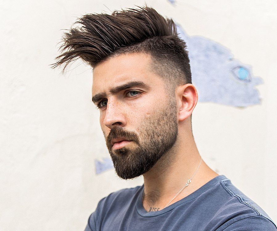 spiky hair with a fade and a full beard is a bold idea to show off your personality